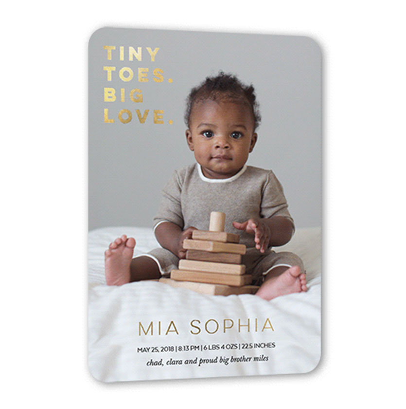 Flat baby announcement card with gold lettering and portrait photo